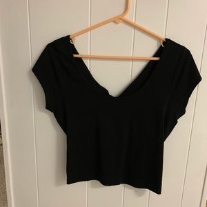 All black crop top with cut out back size large